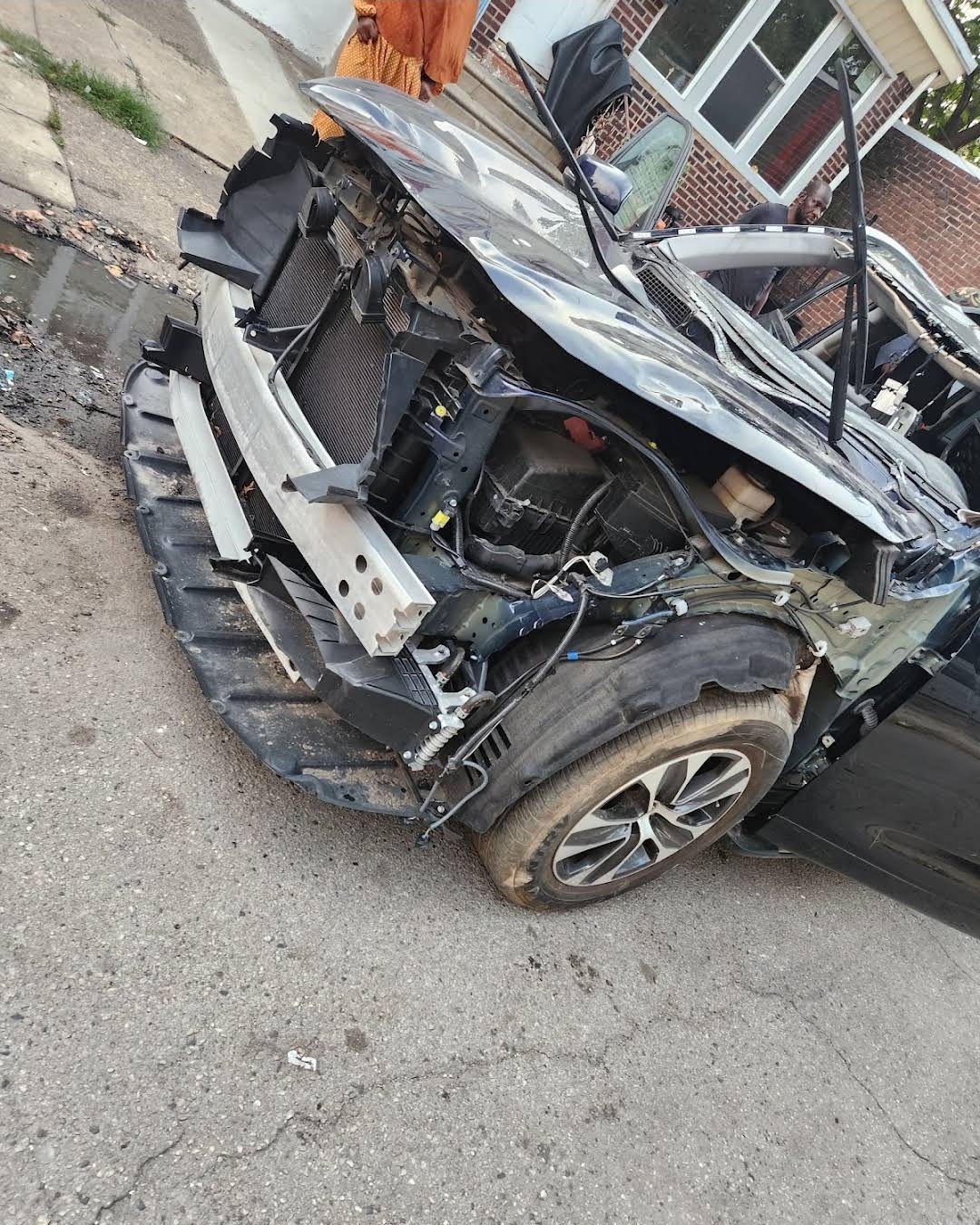 Front-end collision repair in progress at Yocum Street Garage